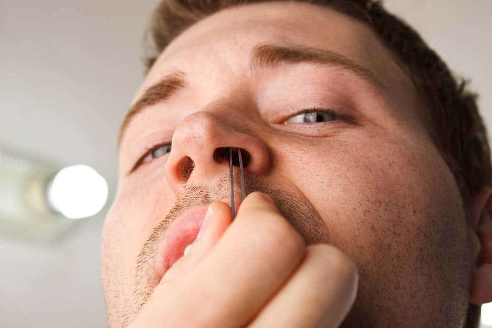 You Should Never Pluck Your Nose Hair. Here's Why